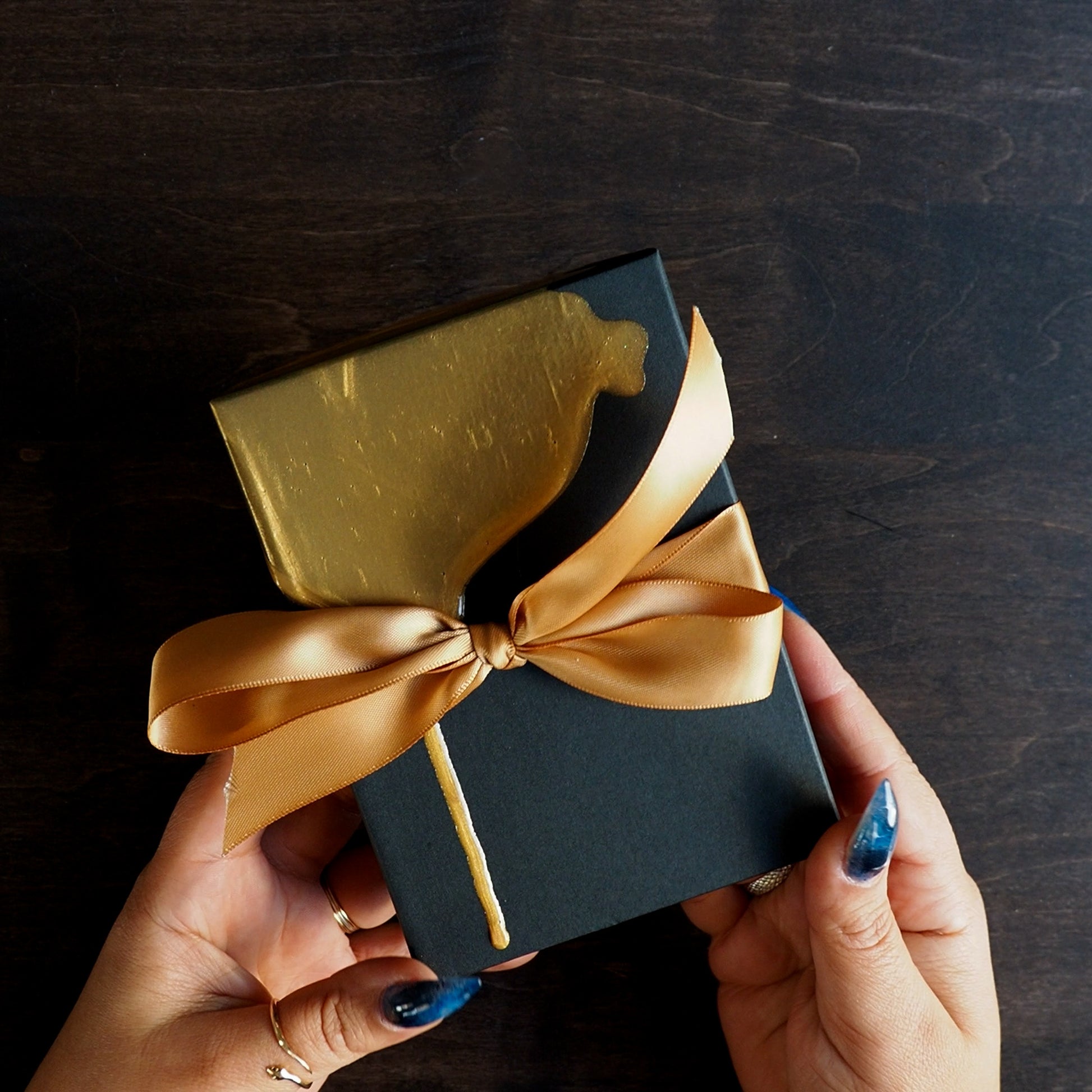 black and gold gift package