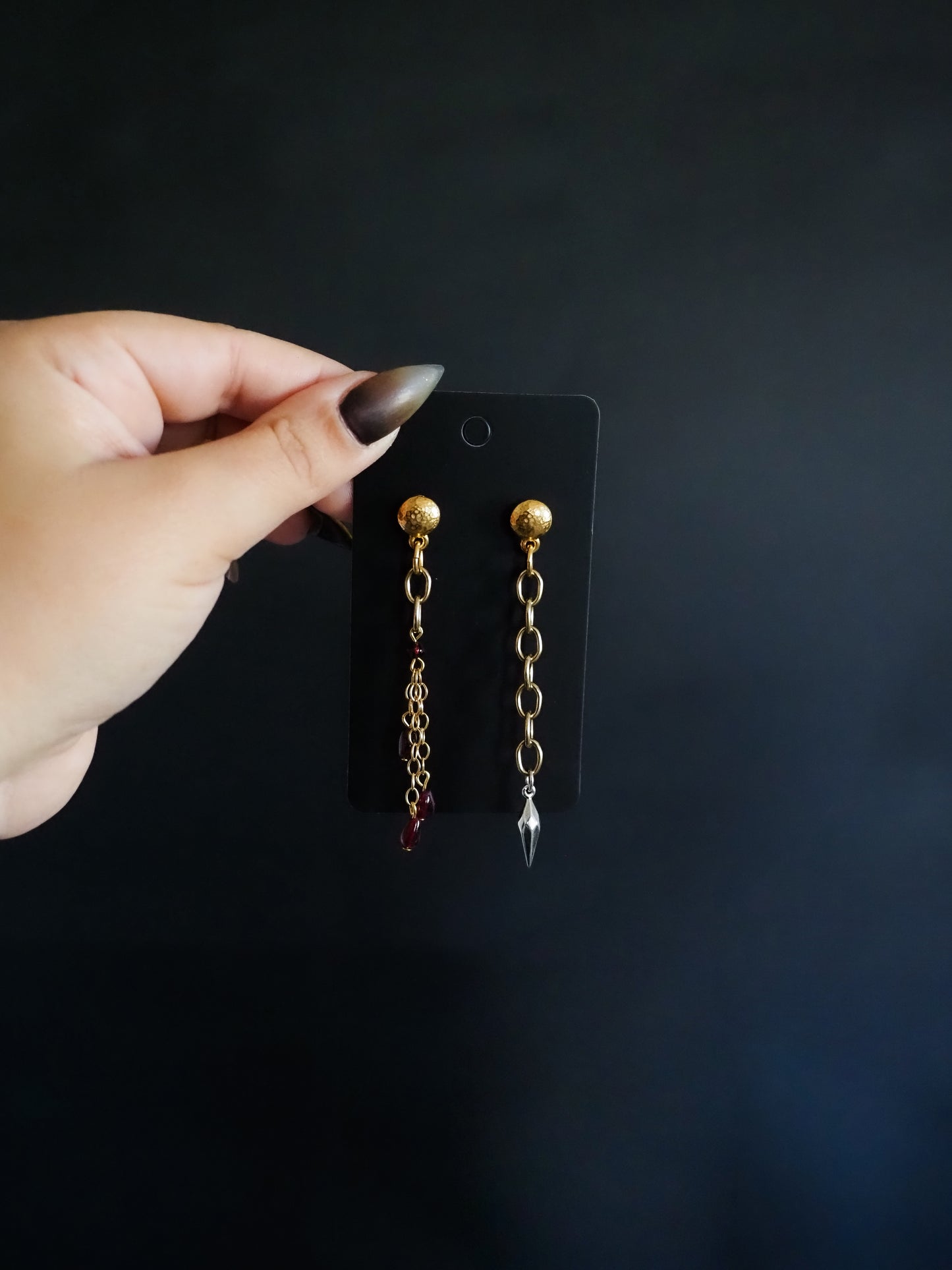 gold and garnet mismatched chain dangle earrings